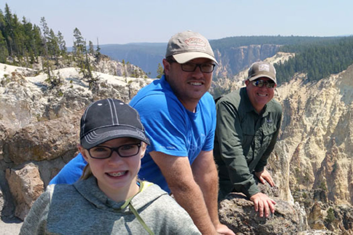 Smiling Small Group on Multi-Day Tour of Yellowstone National Park - Buffalo Roam Tours