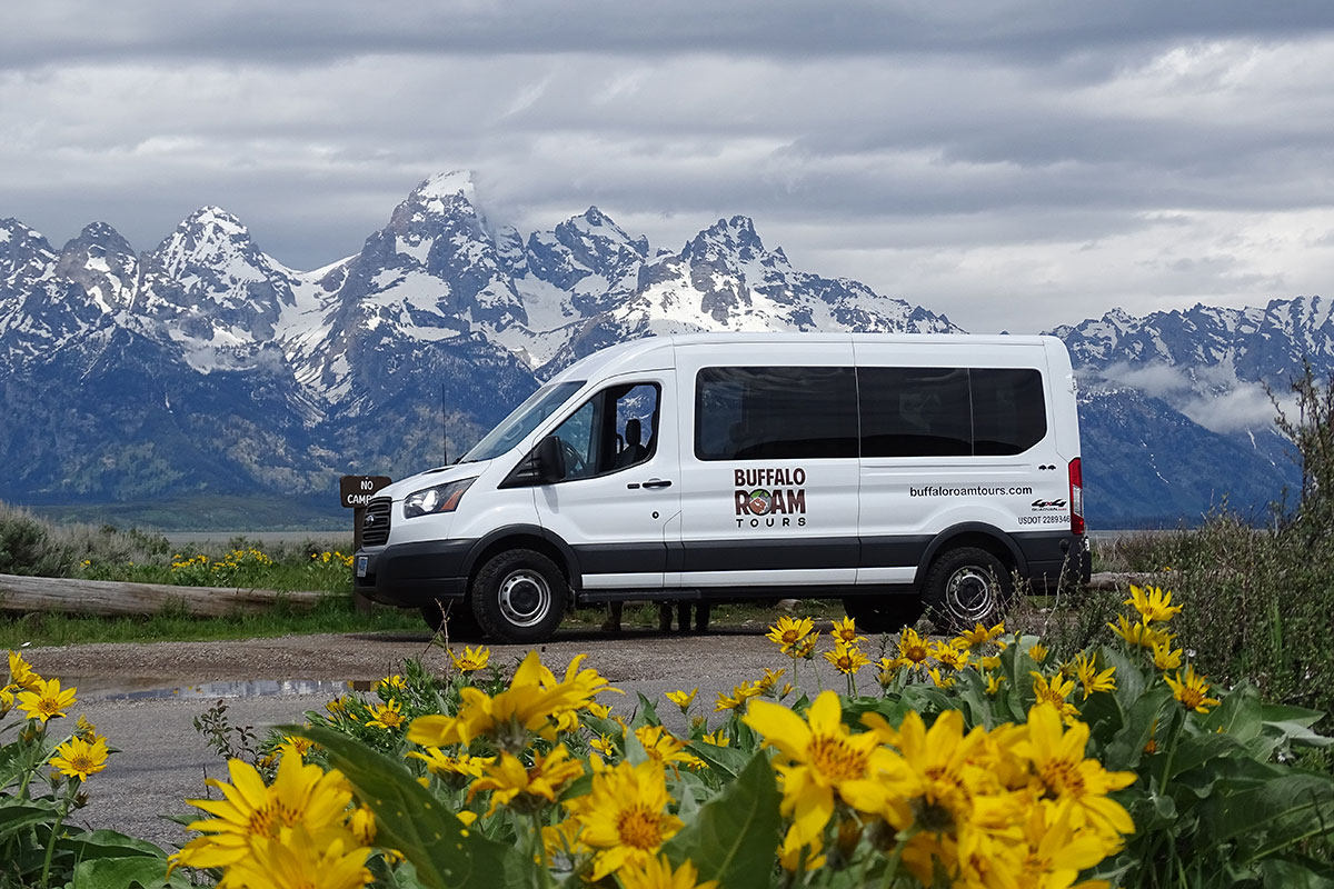 Private Grand Teton Tour Van in Front of Teton Mountain Range - Buffalo Roam Tours