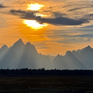 Golden summer sunset over the mountains of Grand Teton National Park